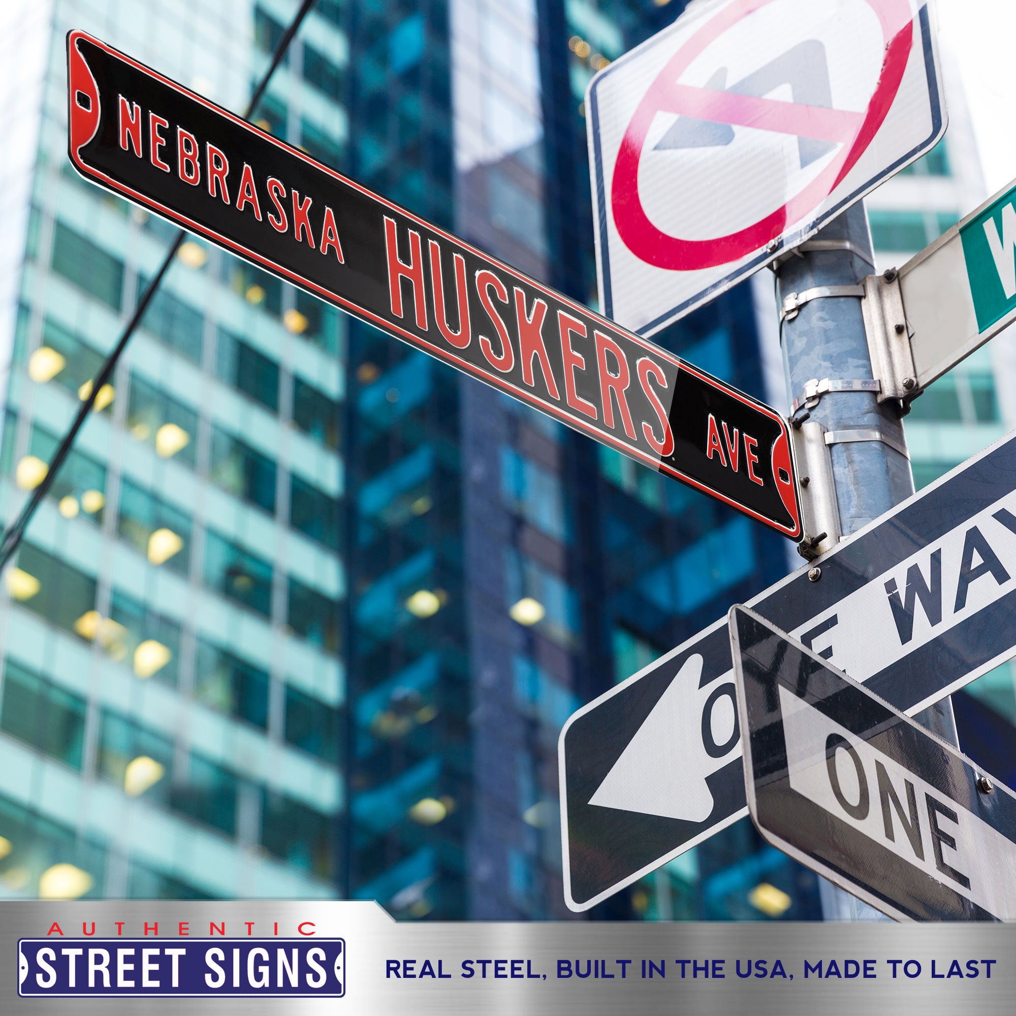 Nebraska Cornhuskers - HUSKERS AVE - Black Embossed Steel Street Sign
